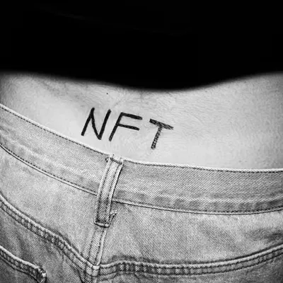 Lower Back Tattoo in black and white