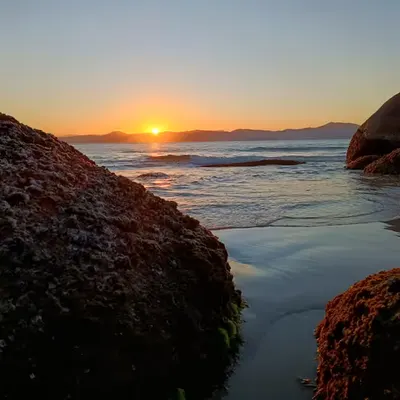Sunset between rocks