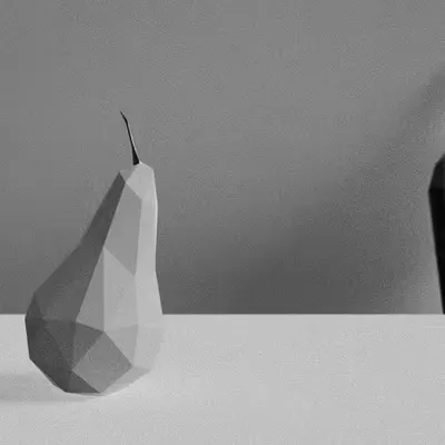 Still life with a single pear and a self-reference