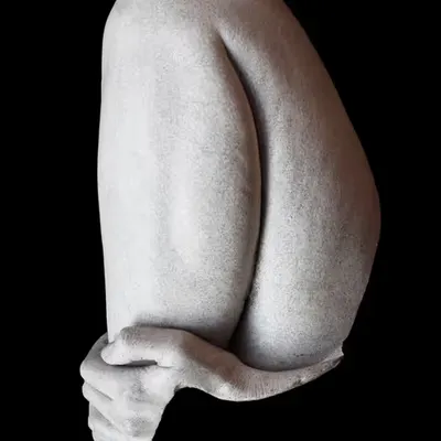 Hand on shin