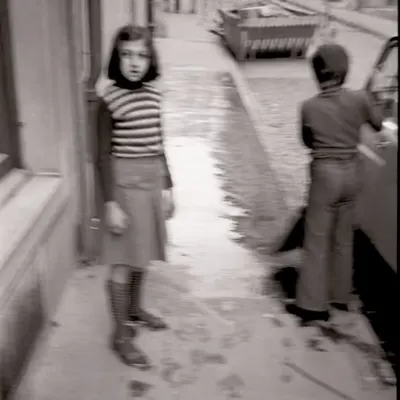 Children Playing on a Sidewalk