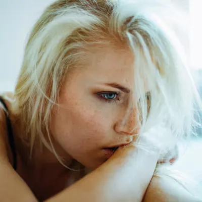 Blue eyes freckles women portrait