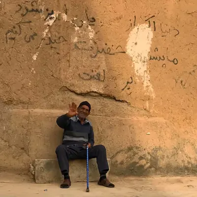 Warm Smile Amidst Earthen Walls