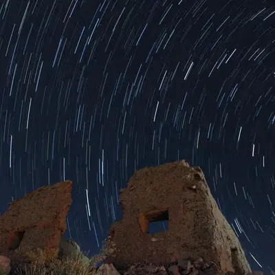 Timeless Ruins Beneath the Star Trails