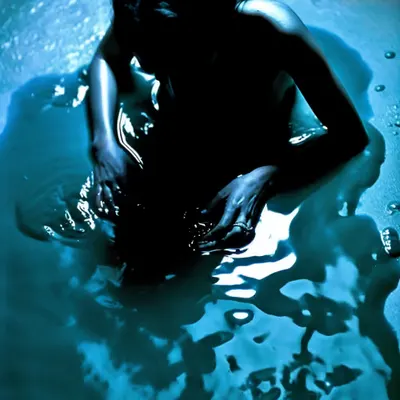 Submerged in Solitude: The Blue Hues of Isolation