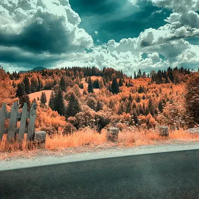 Mountain, Sky, Road and a Touch of Fence